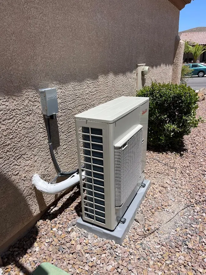 Residential air conditioning condenser unit in Clyde